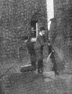 Boys cleaning the yard