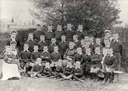 Staff and children in the garden