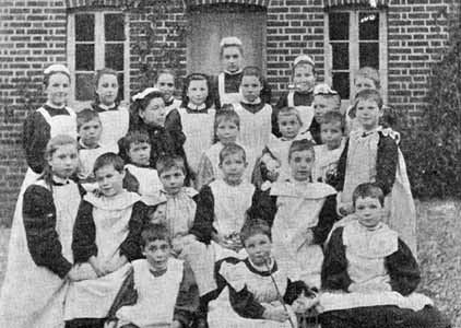 The girls outside their home