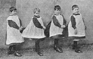 Four small girls outside the Home
