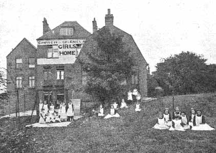Girls sitting on the lawn